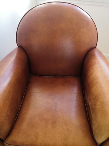 Tawny vintage leather club chair