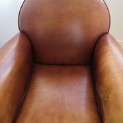 Tawny vintage leather club chair