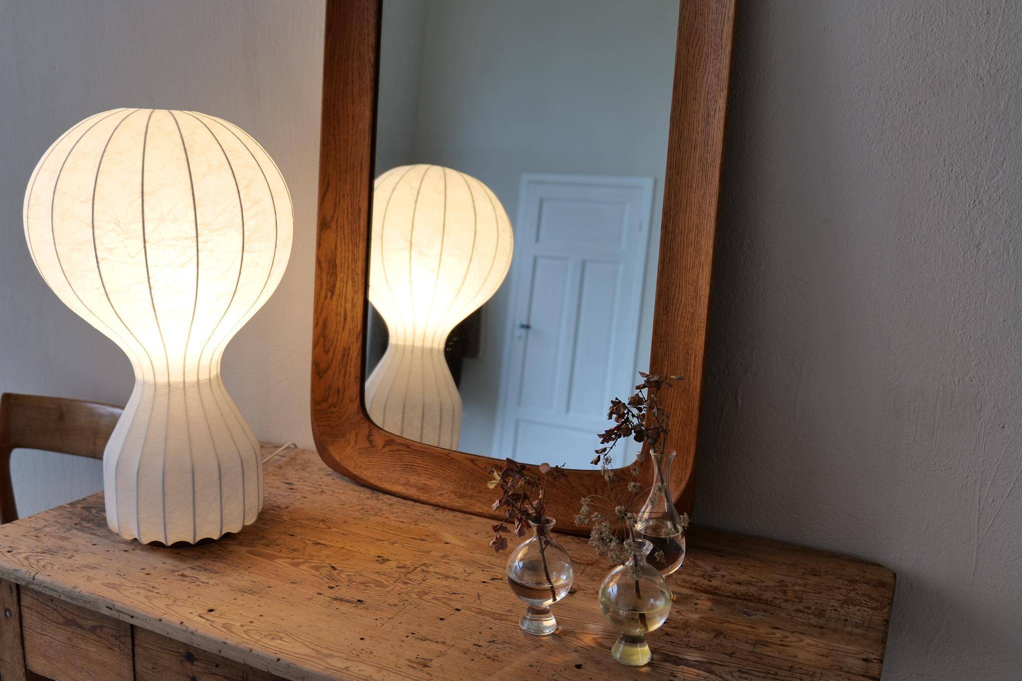 Mid-century modern sculptural wall mirror in stained oak, glass, Glas & Trä 1959