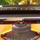 Silver reed orange and black typewriter with bag