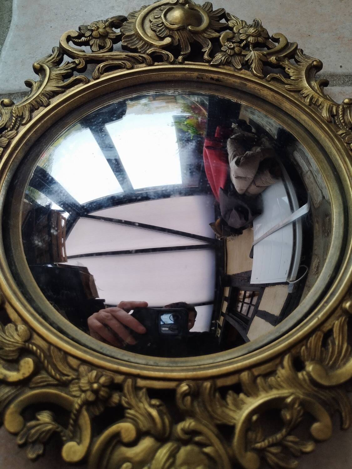 Pair of antique witch mirrors, curved glass, bronze frame