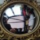 Pair of antique witch mirrors, curved glass, bronze frame