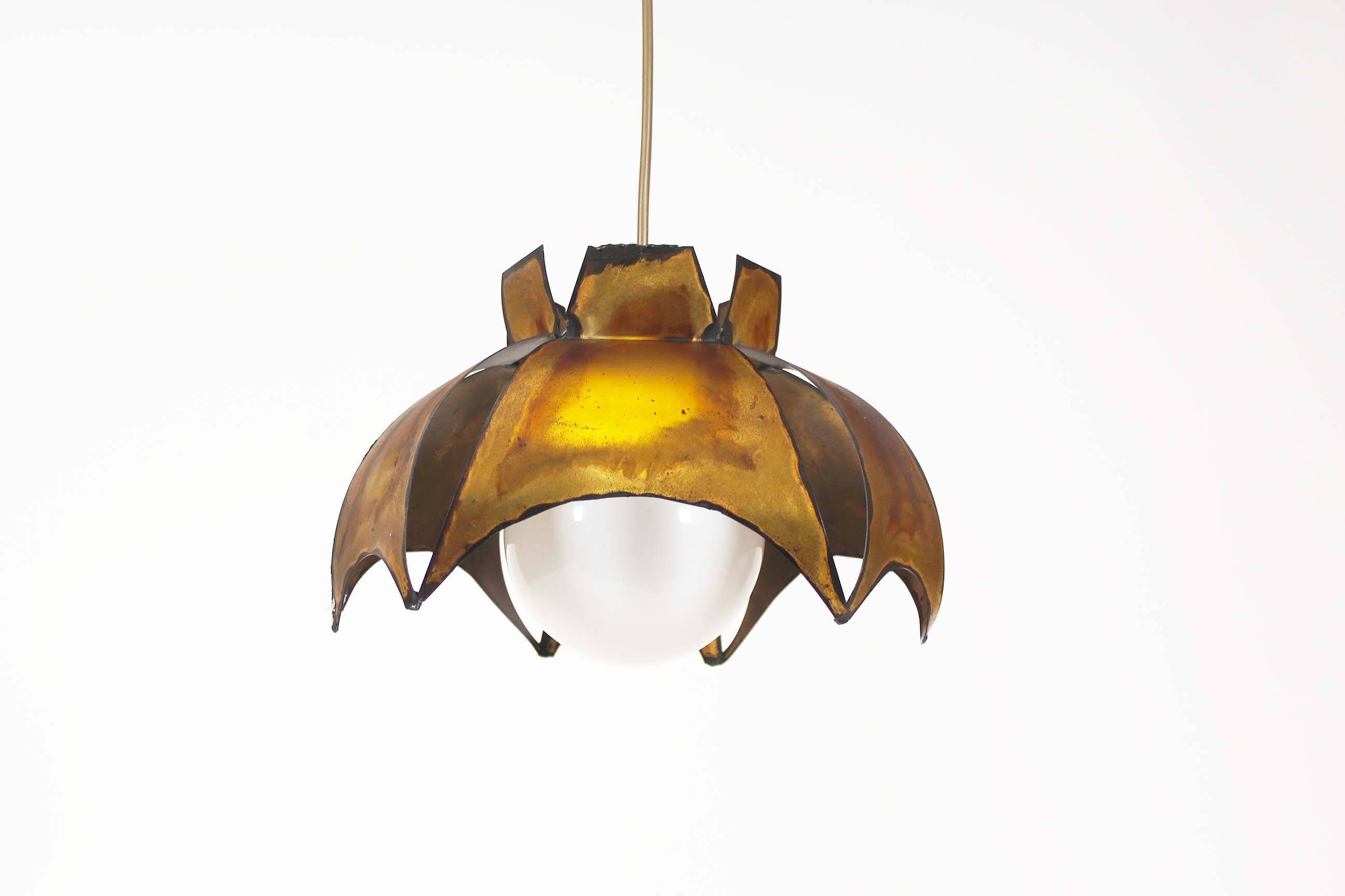 Original Italian torch cut brutalist brass chandelier