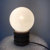 Vintage globe opaline lamp on raw wooden base