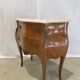 Old curved chest of drawers inlaid and marble Louis XV style