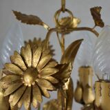 golden chandeliers with flowers.