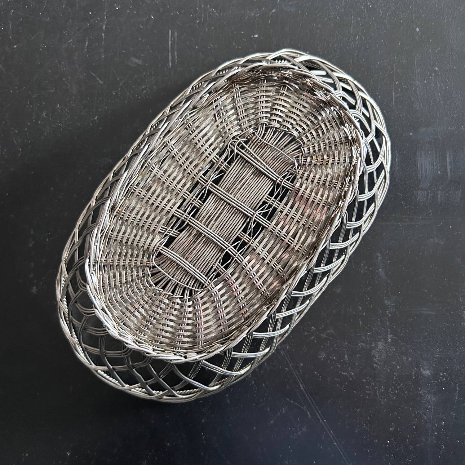 Silver woven metal basket