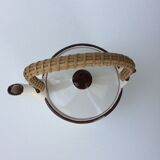 Vintage teapot with wicker handle