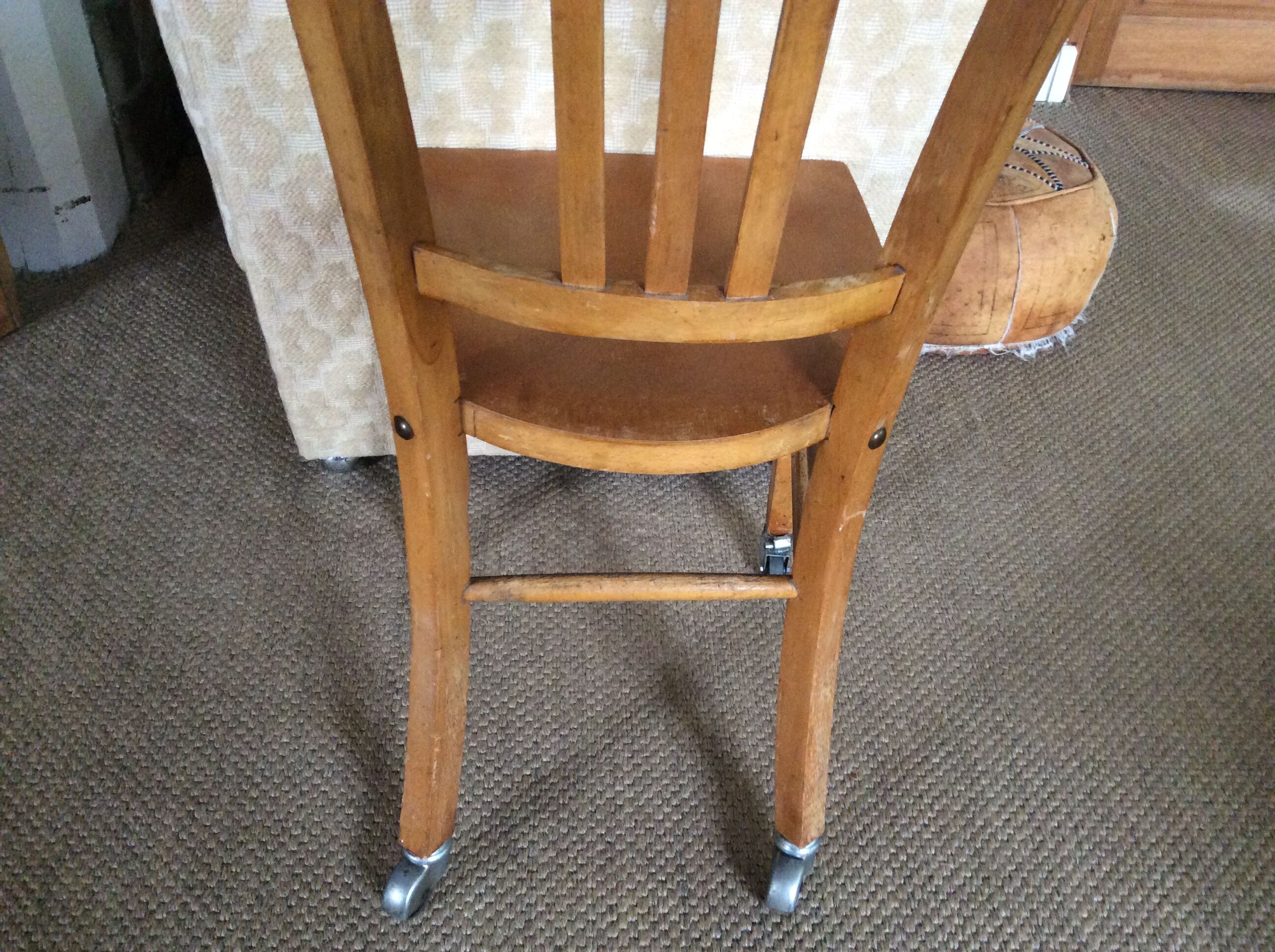 Wooden chair with wheels