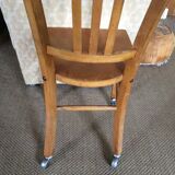 Wooden chair with wheels