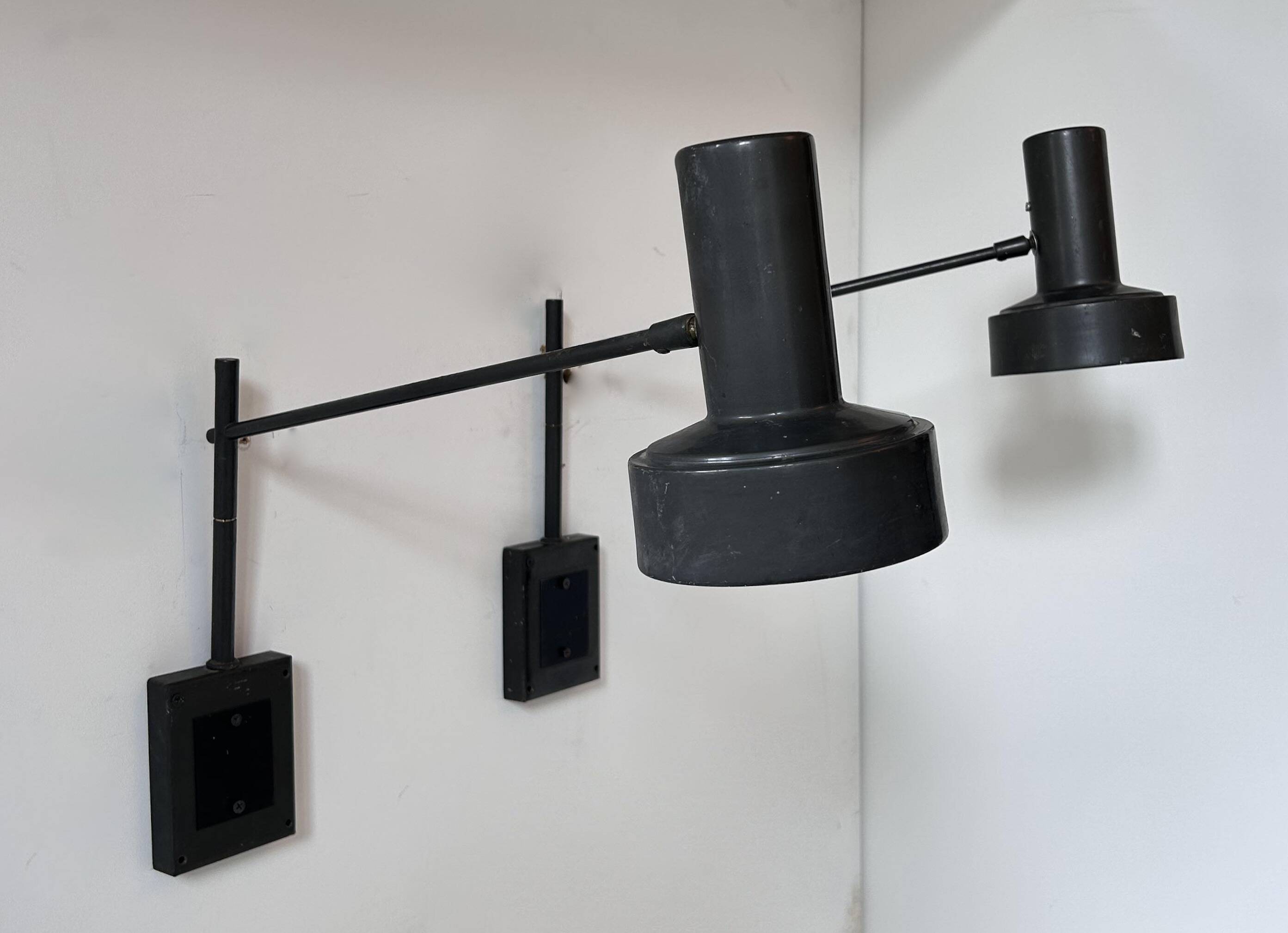 Pair of vintage adjustable wall lights, matte black metal, France 1960s