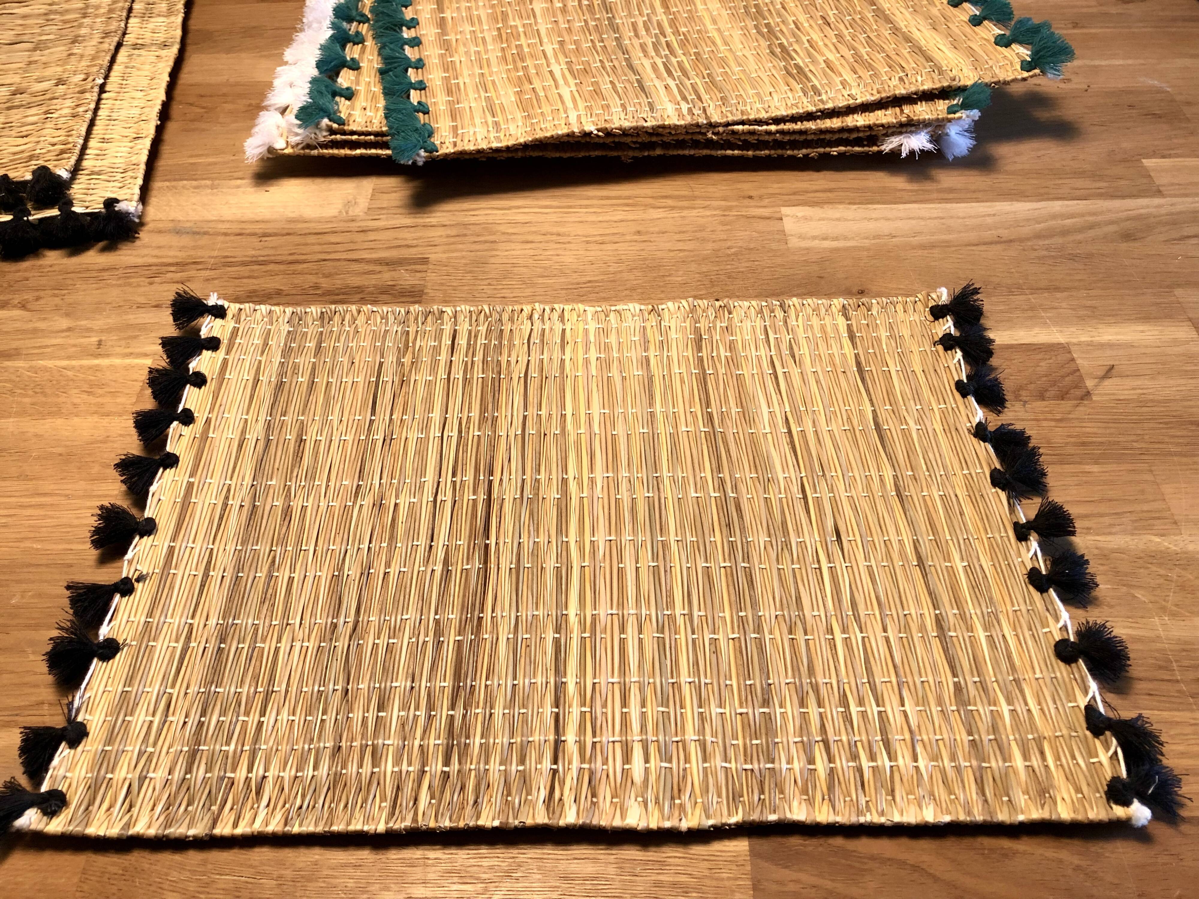Braided placemats with pompoms