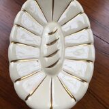 White and gold ceramic plate