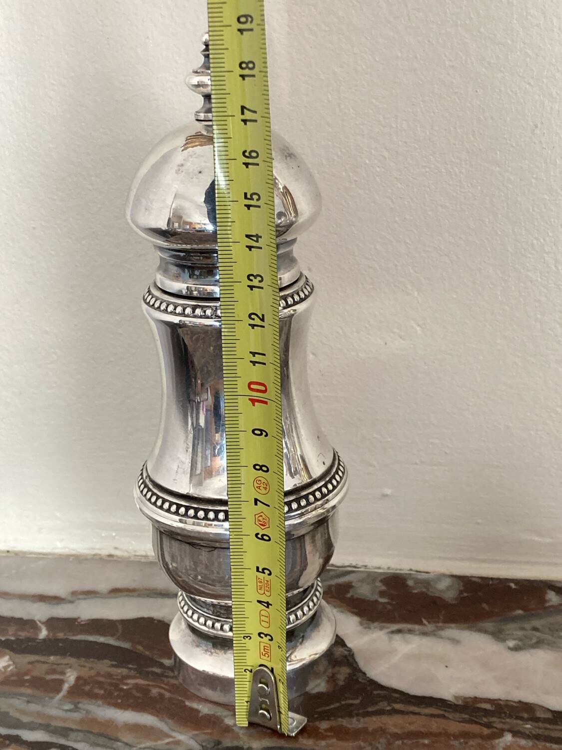 Silver metal pepper mill