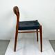 A beautiful pair of modern Scandinavian dining chairs in teak, model 75 by Niels Otto Møller.