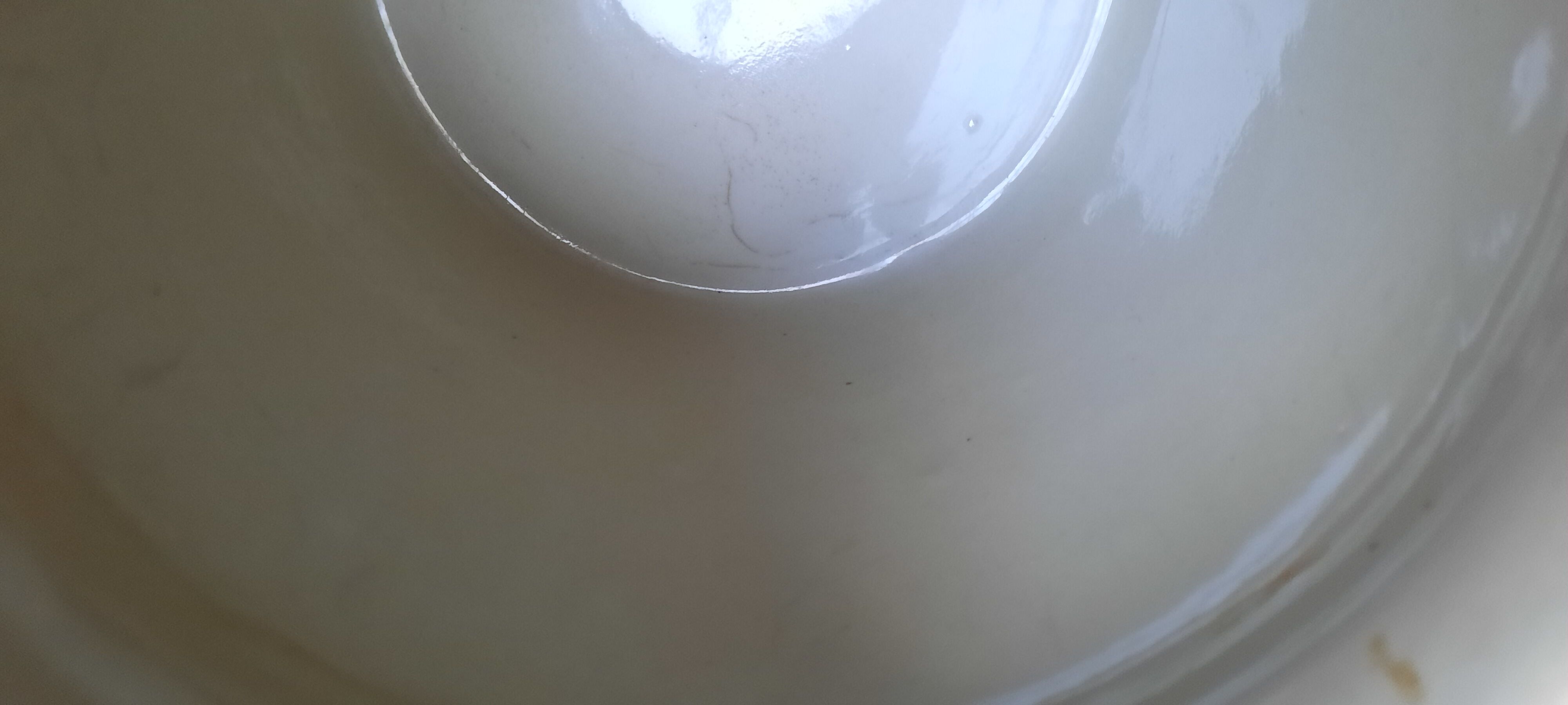 Beige glazed stoneware pot