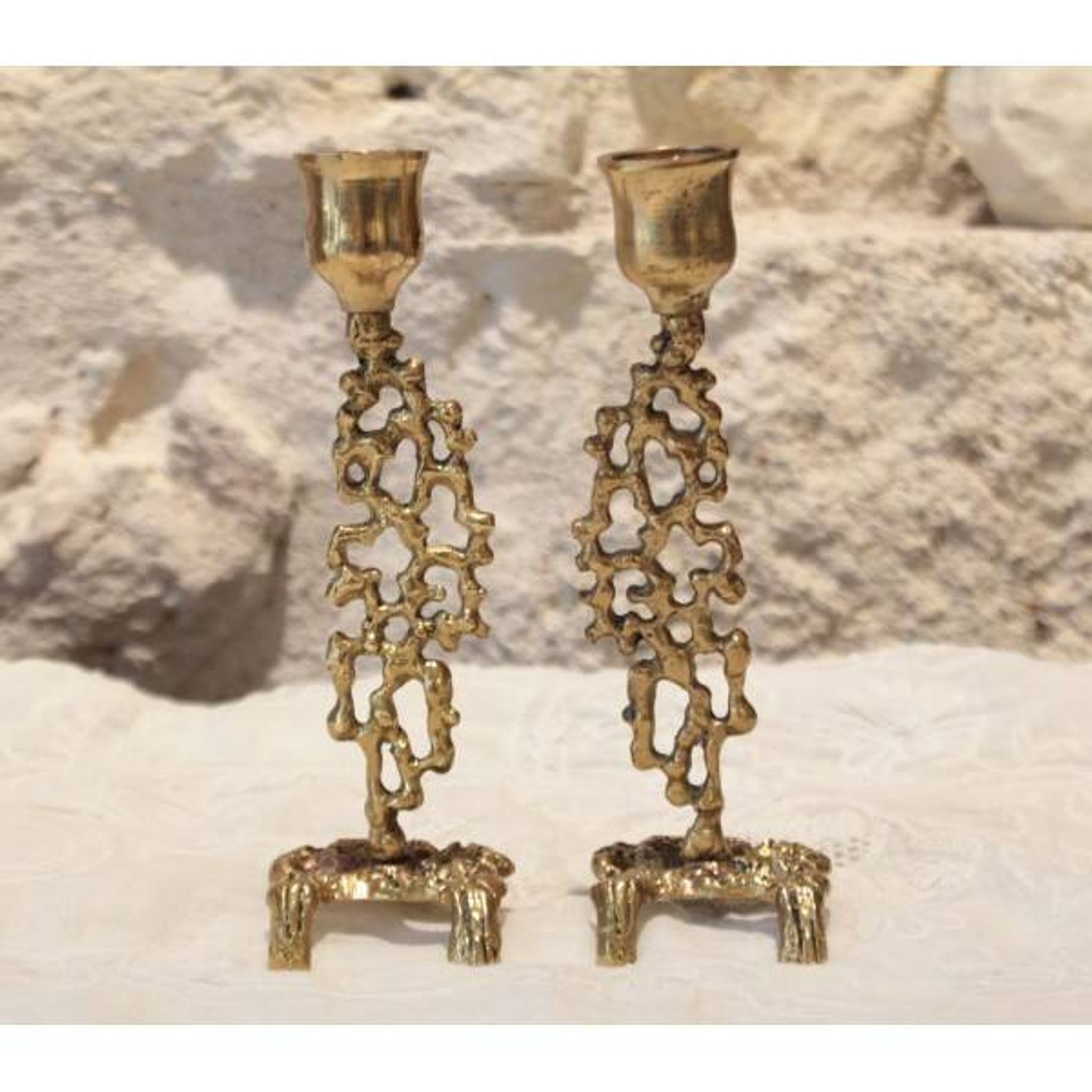 Pair of gilded bronze candlestick holders in brutalist style from around 1970.