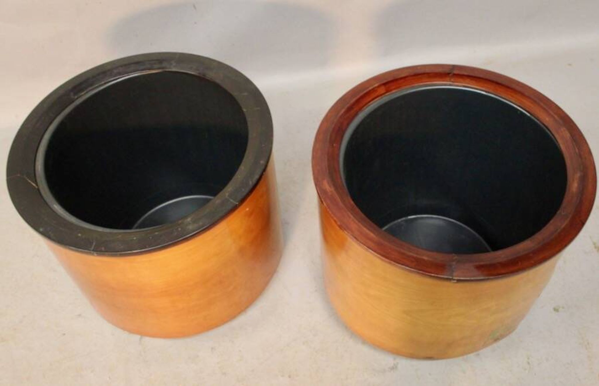 Pair of flower pot covers with interior.