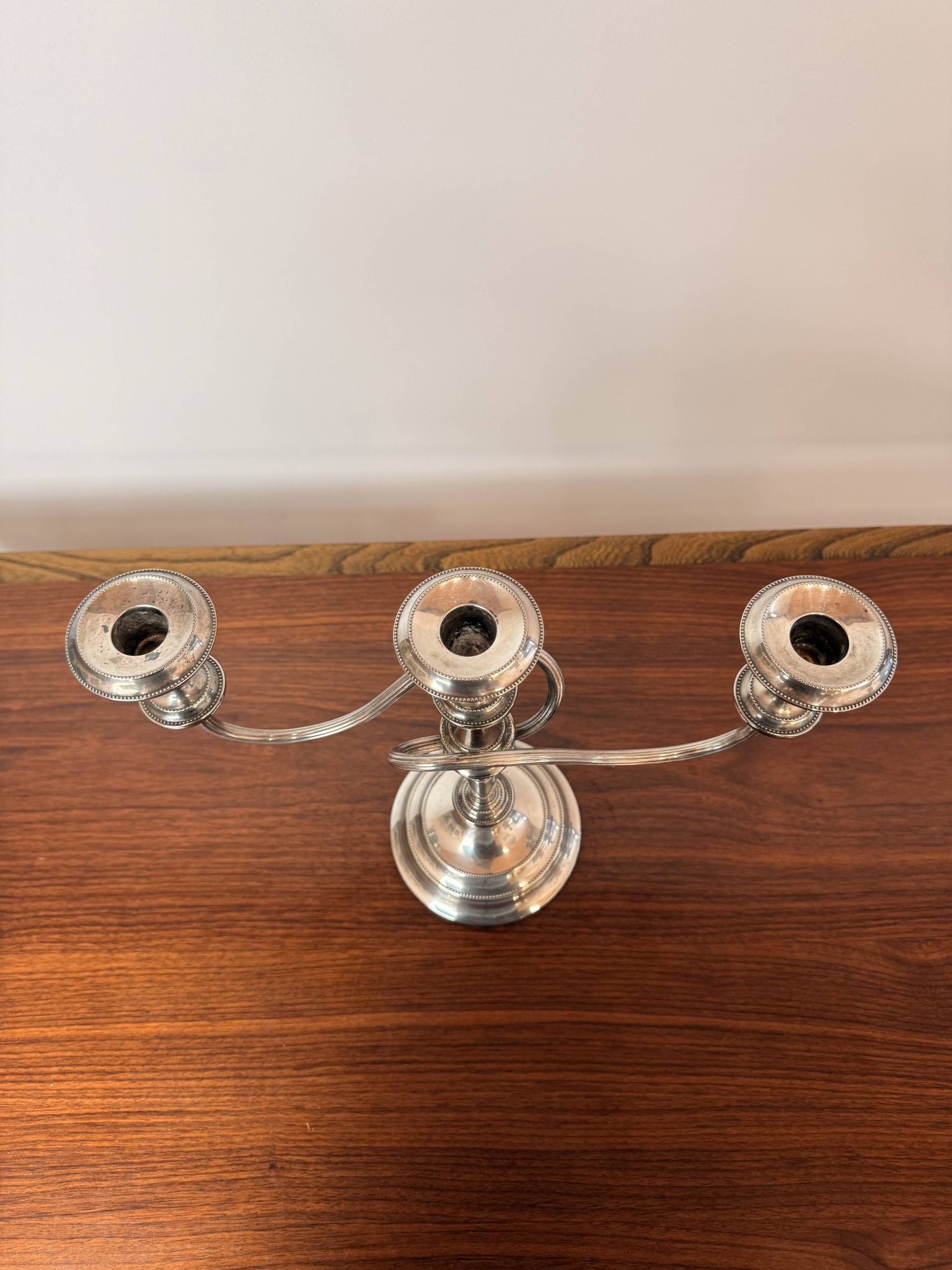 Vintage twisted chandelier with three lights in silver-plated metal.