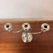 Vintage twisted chandelier with three lights in silver-plated metal.