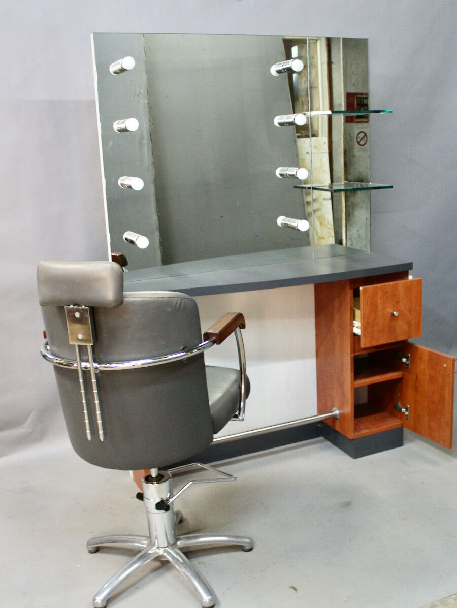Spotlight hairdresser and her vintage barber chair