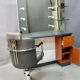 Spotlight hairdresser and her vintage barber chair