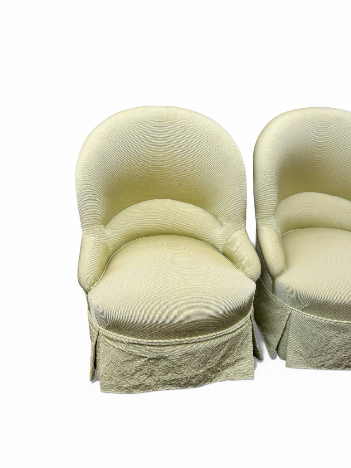 Paire de fauteuils crapaud tapissés pastel vert pomme