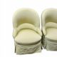 Paire de fauteuils crapaud tapissés pastel vert pomme