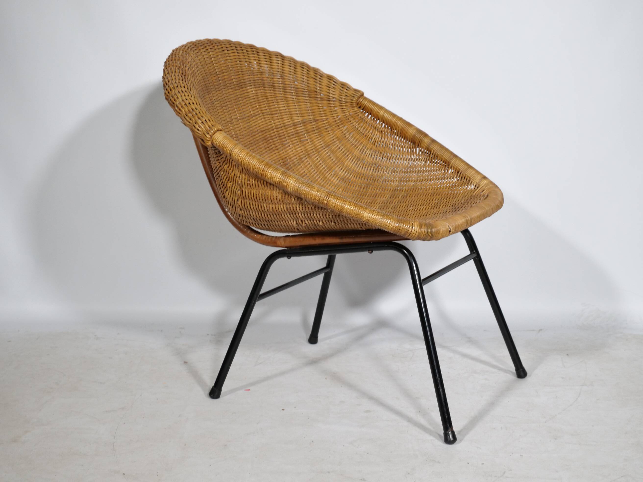 Woven rattan armchair from the 1960s