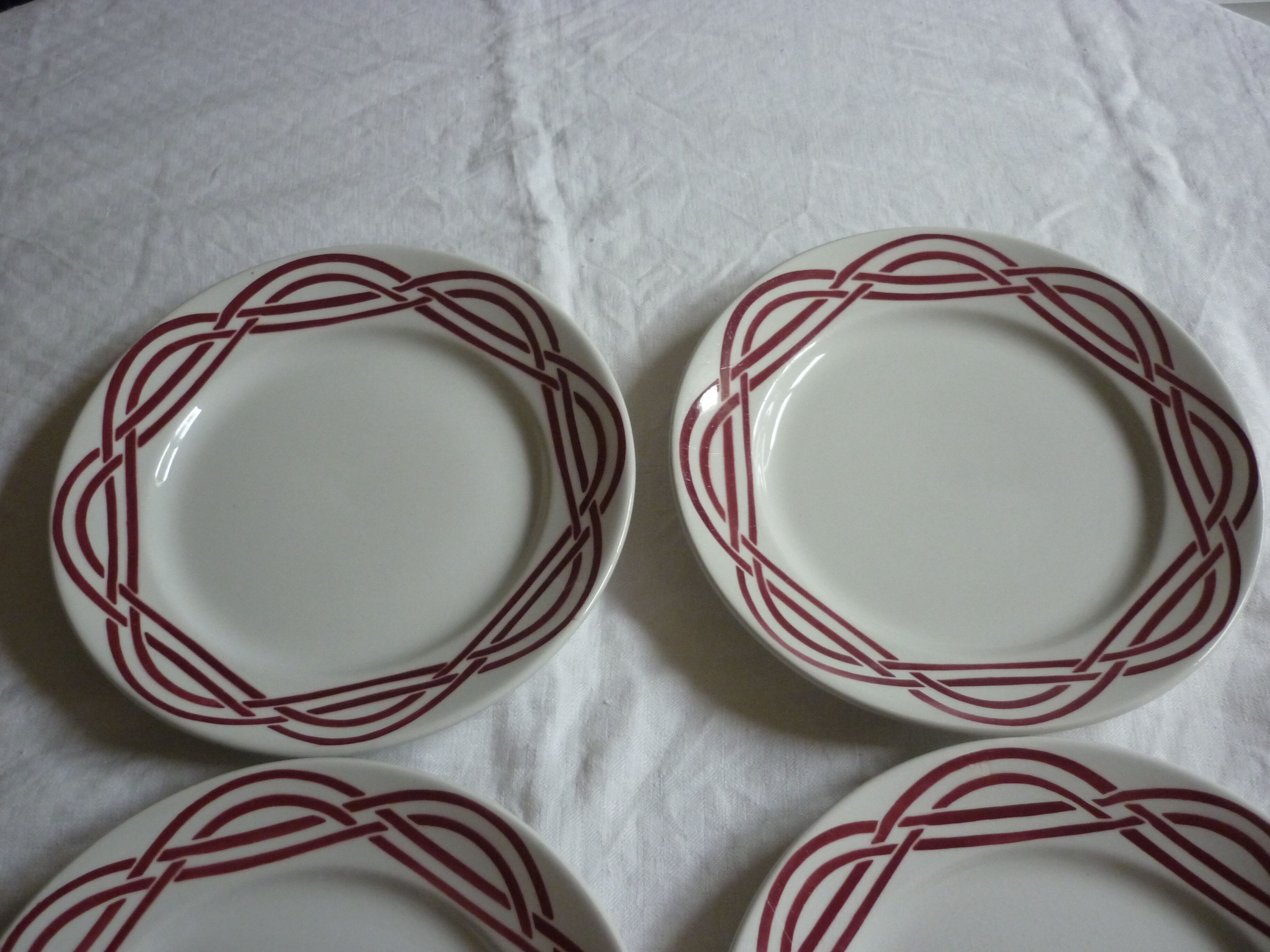 Set of 4 plates in red earthenware
