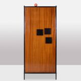 Pair of mahogany veneer and black lacquered iron cabinets. 1950s.