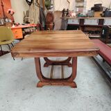 Art Deco extendable table in solid wood and brass.