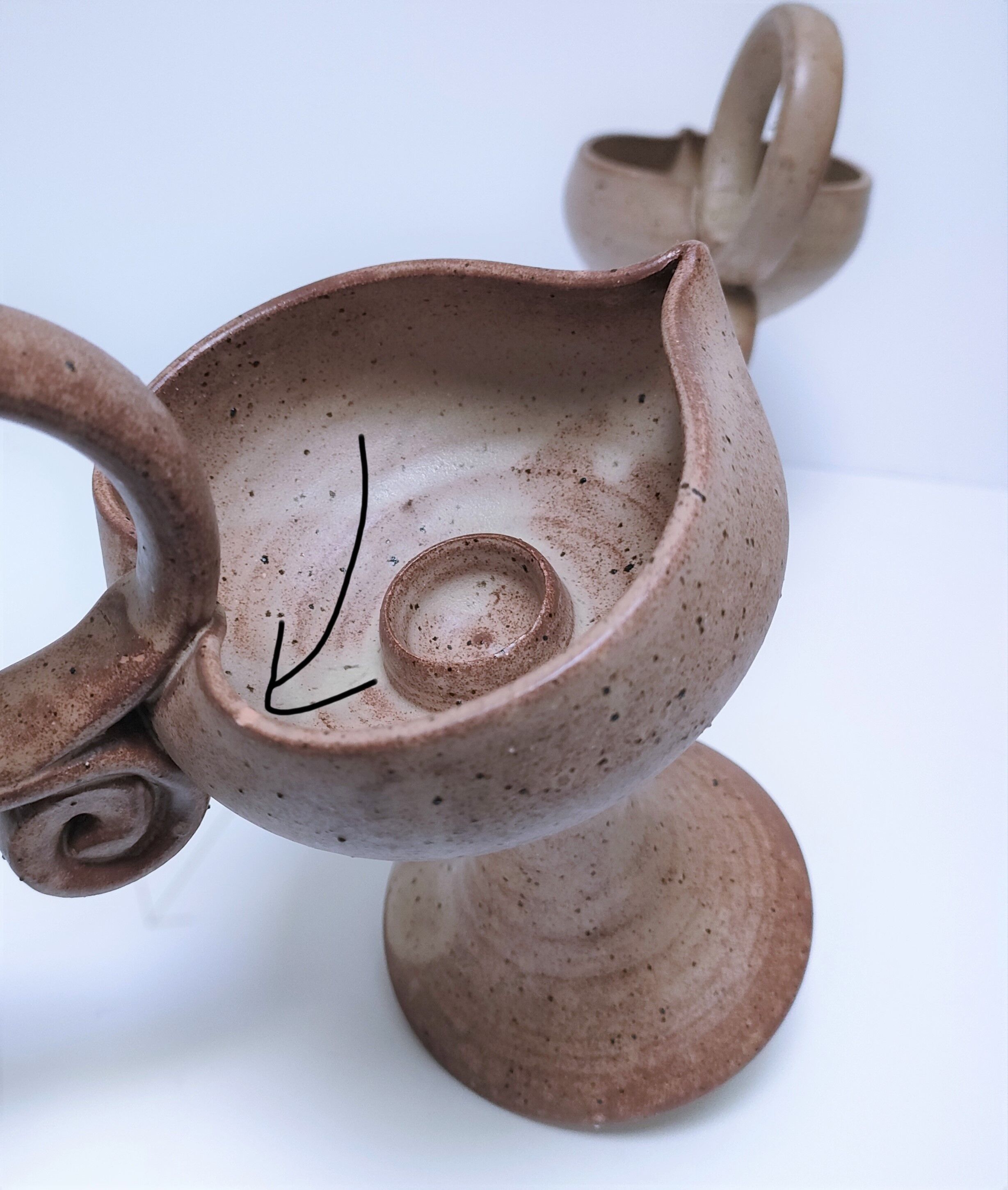 Pair of vintage “heart” sandstone candlesticks