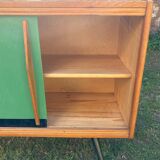 Sideboard with green sliding doors, circa 1950