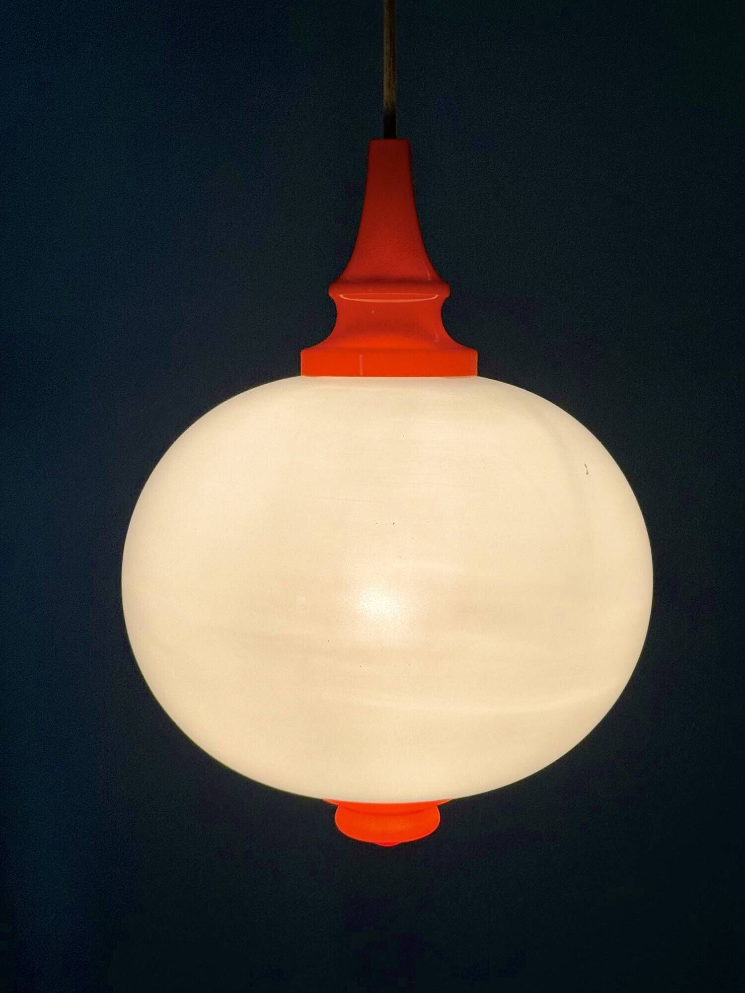 Space Age pendant lamp with milk glass ball and orange accents