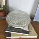 Large round wall lamp ceiling light in transparent vintage glass from the 1970s.