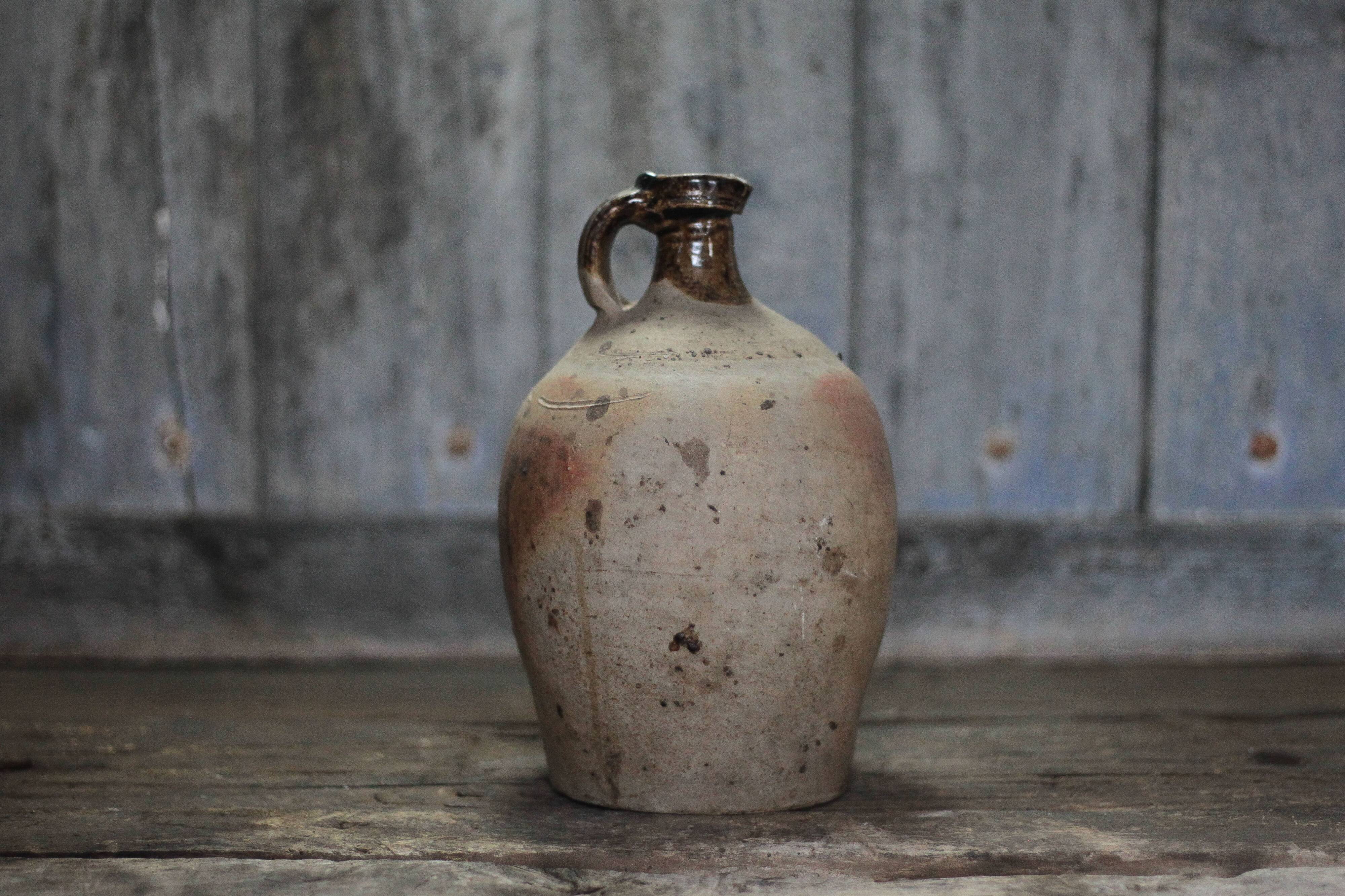Antique handled pot, antique pot, handled jar, interior decoration.