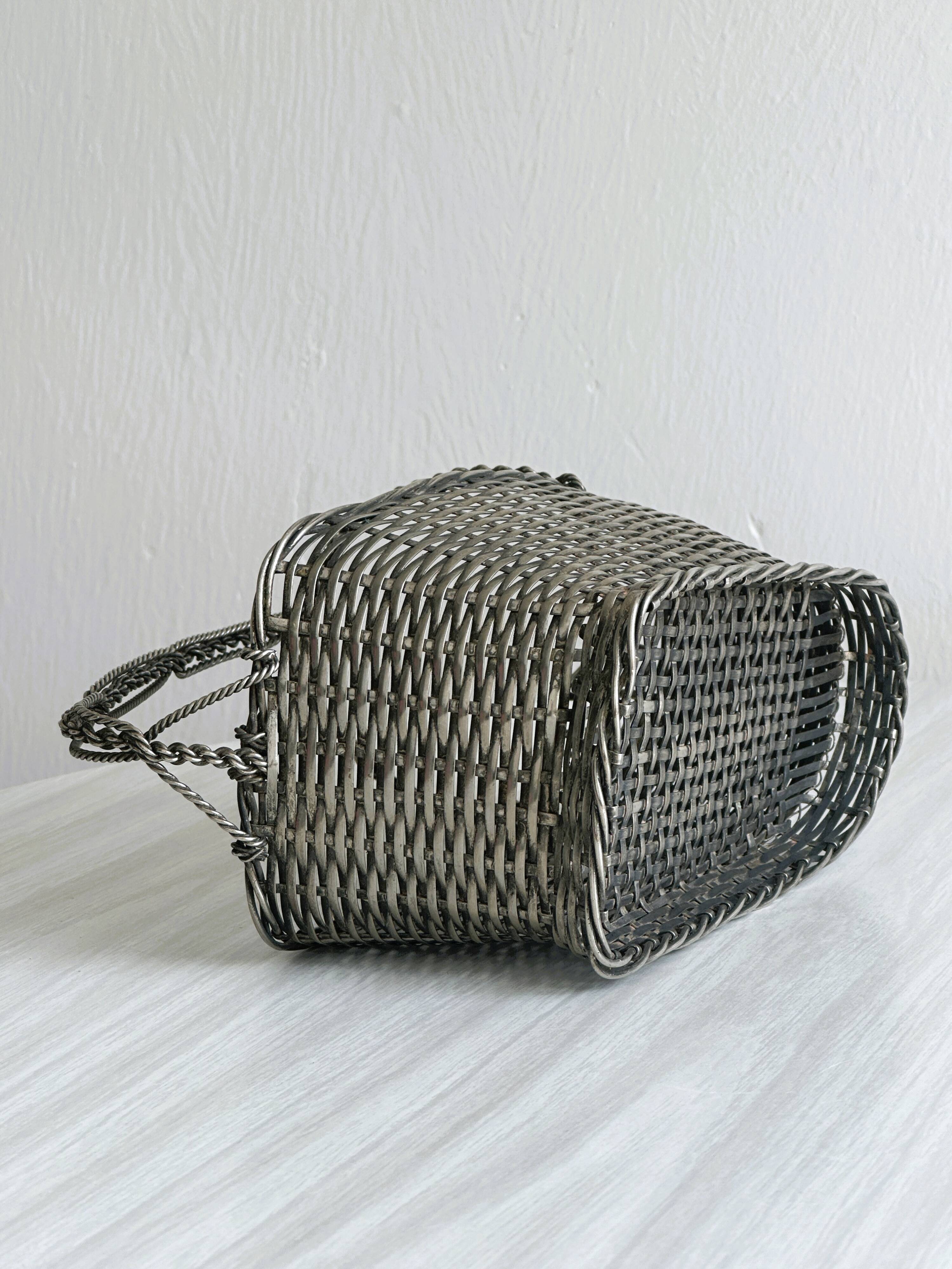 Woven metal wine basket