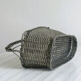 Woven metal wine basket