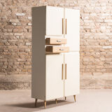 Cupboard equipped with plenty of storage, circa 1950