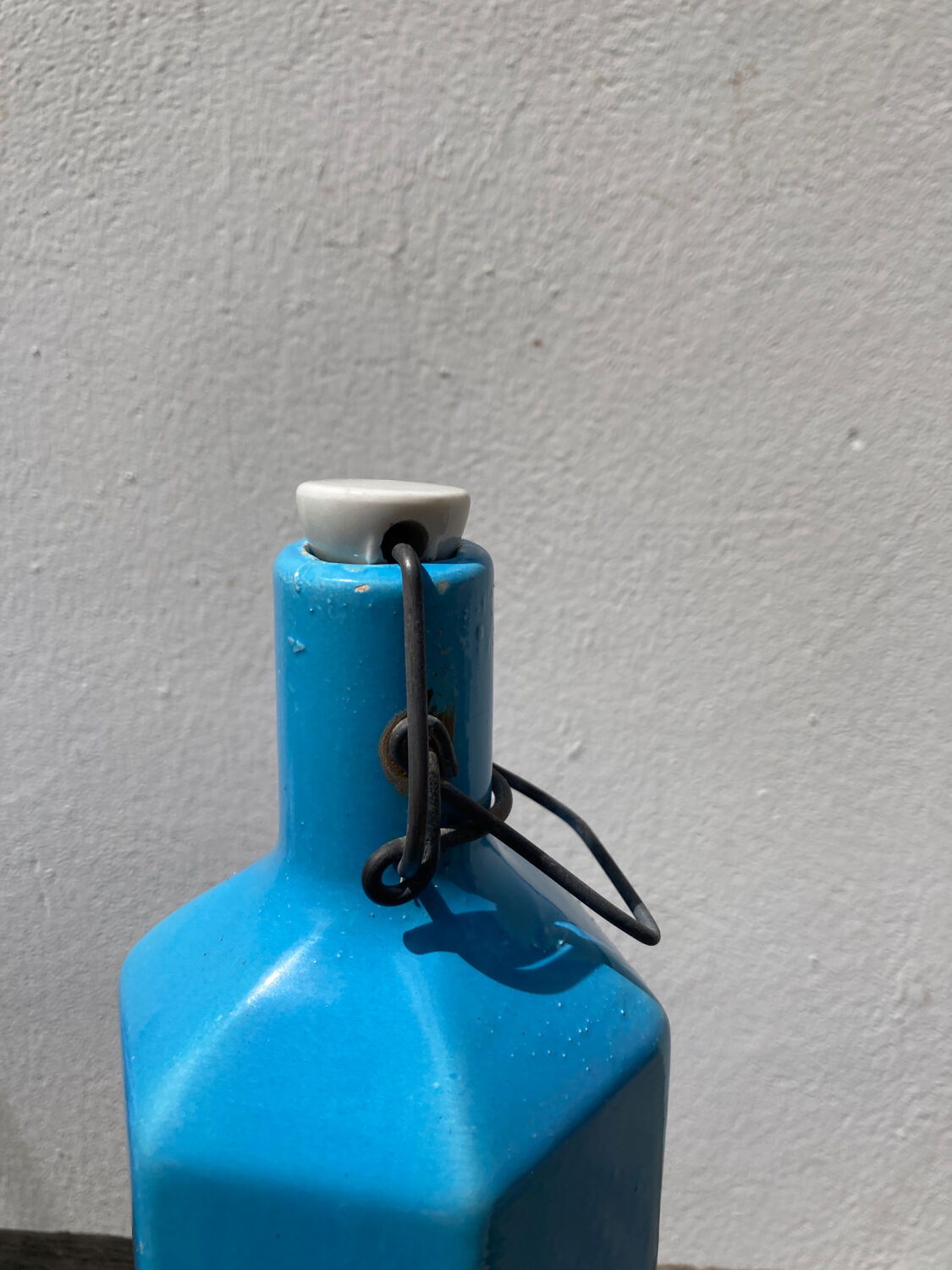 Glazed stoneware bottle signed turquoise blue