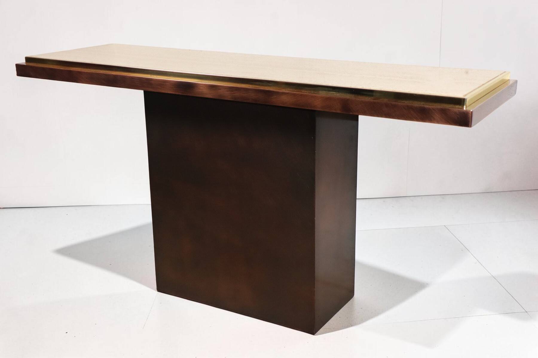 Minimalist console in travertine and patinated metal — 1970s