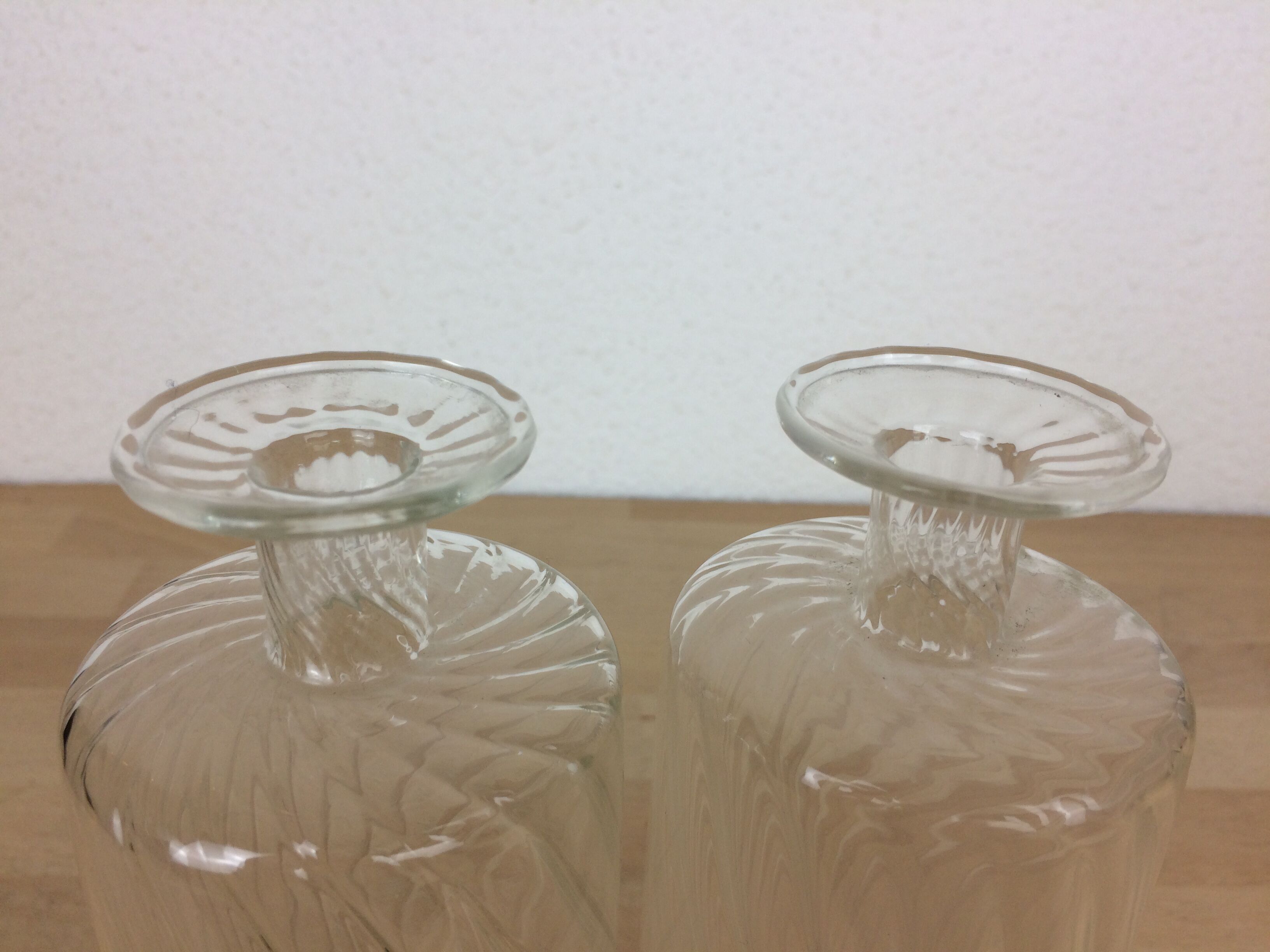 Pair of twisted glass bathroom bottle bottles