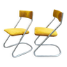 Pair of chrome cantilevered chairs with yellow corduroy seat
