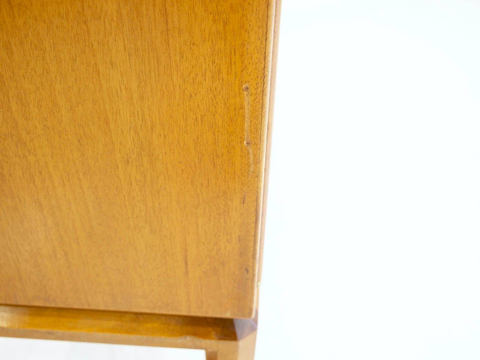 Large Swedish mahogany storage unit with four front doors.