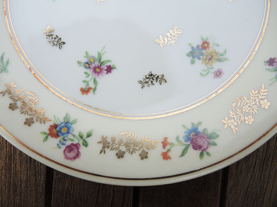 11 Limoges porcelain dessert plates, Raynaud & Co