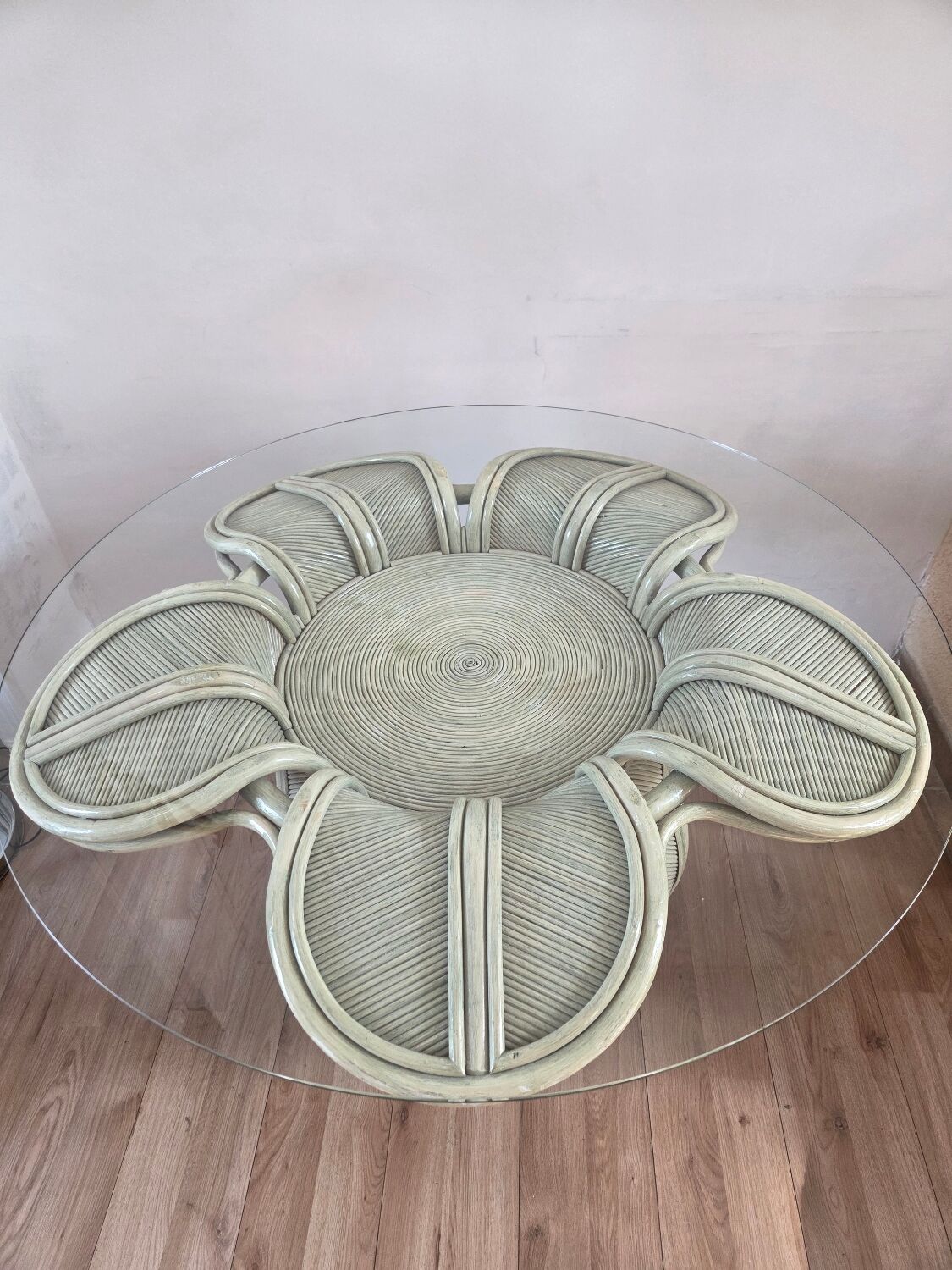 Dining table with a floral design in rattan, 1970.