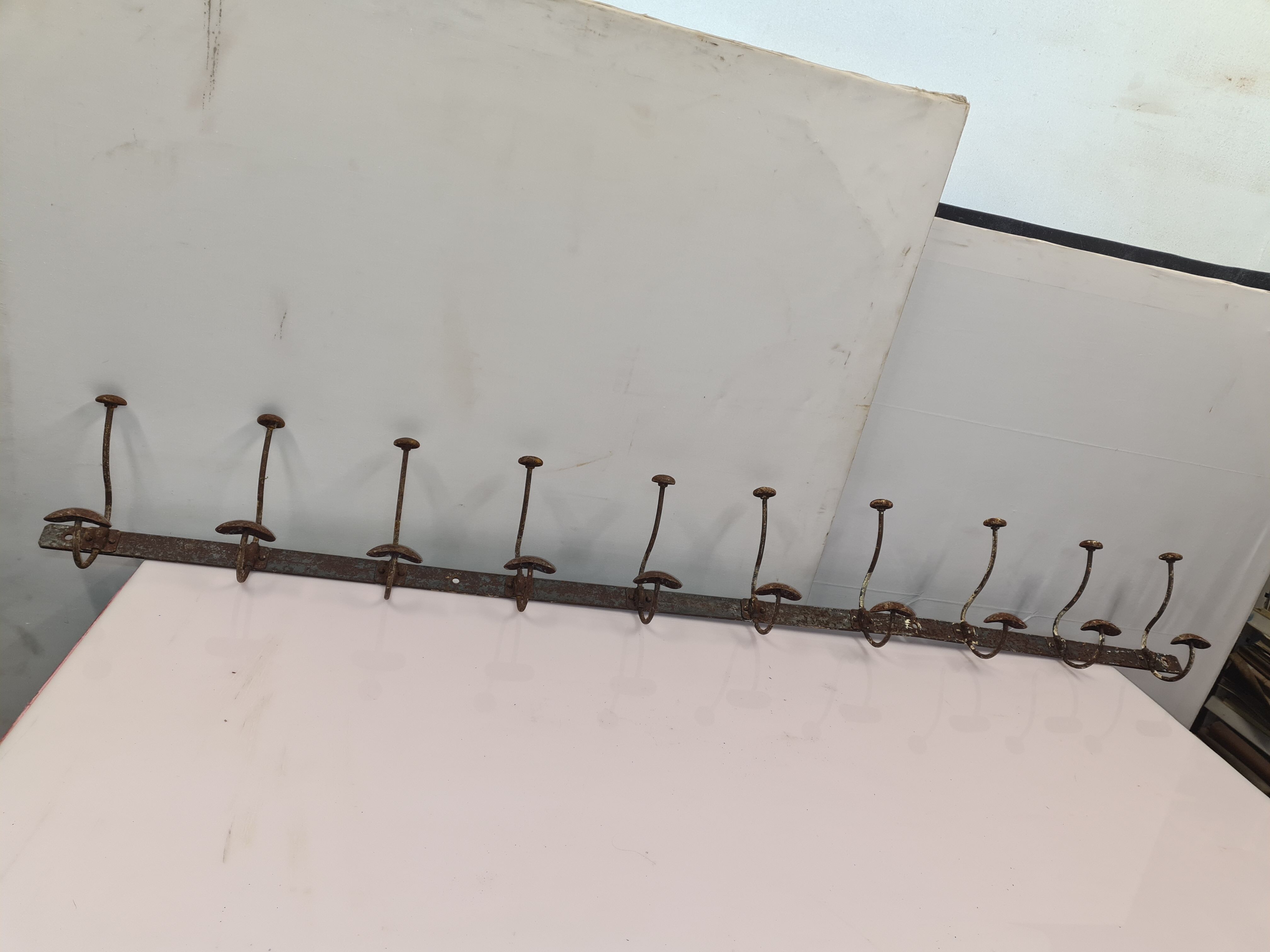 Iron school coat rack