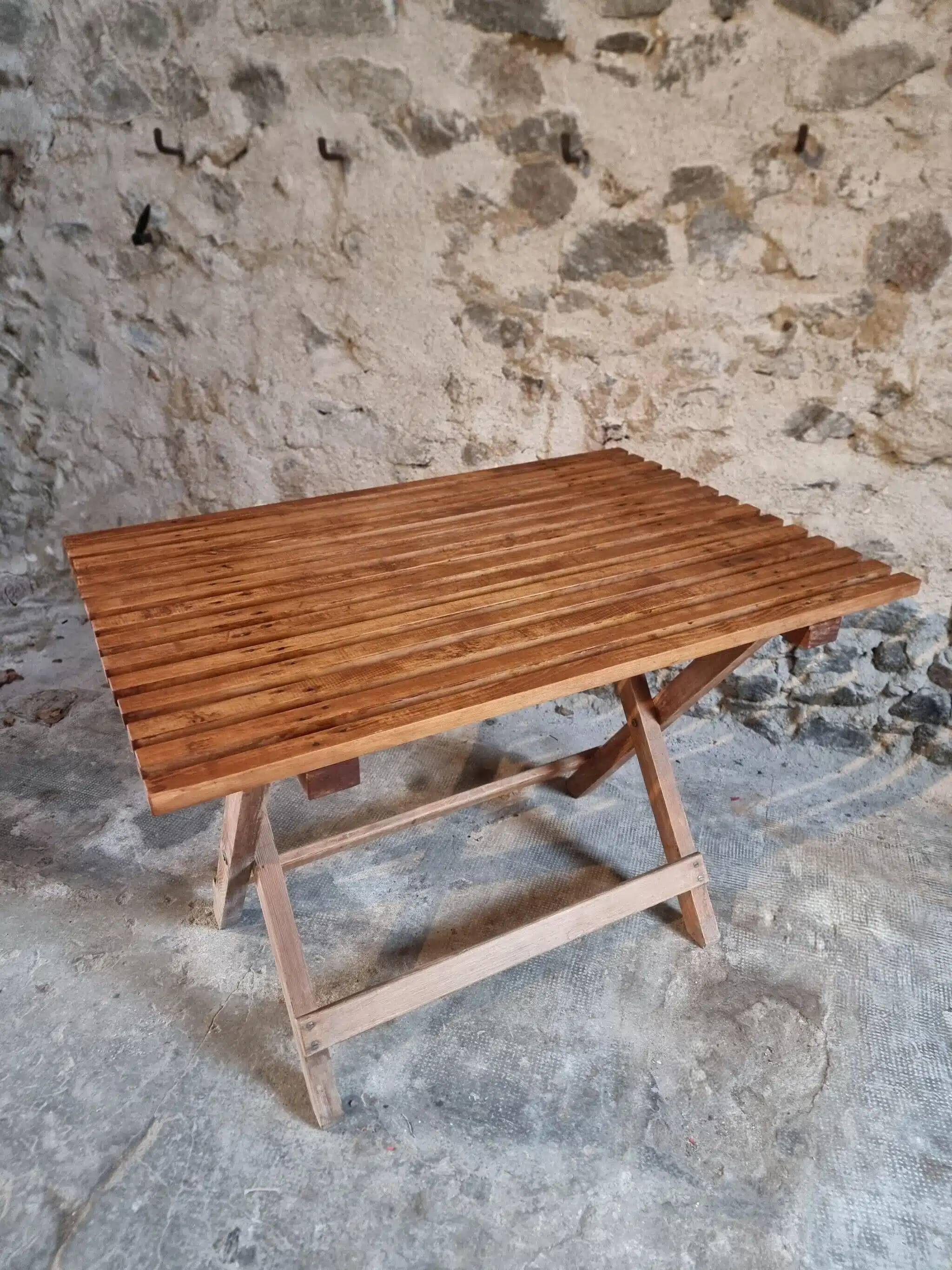Vintage folding garden table in pine, mid-20th century.