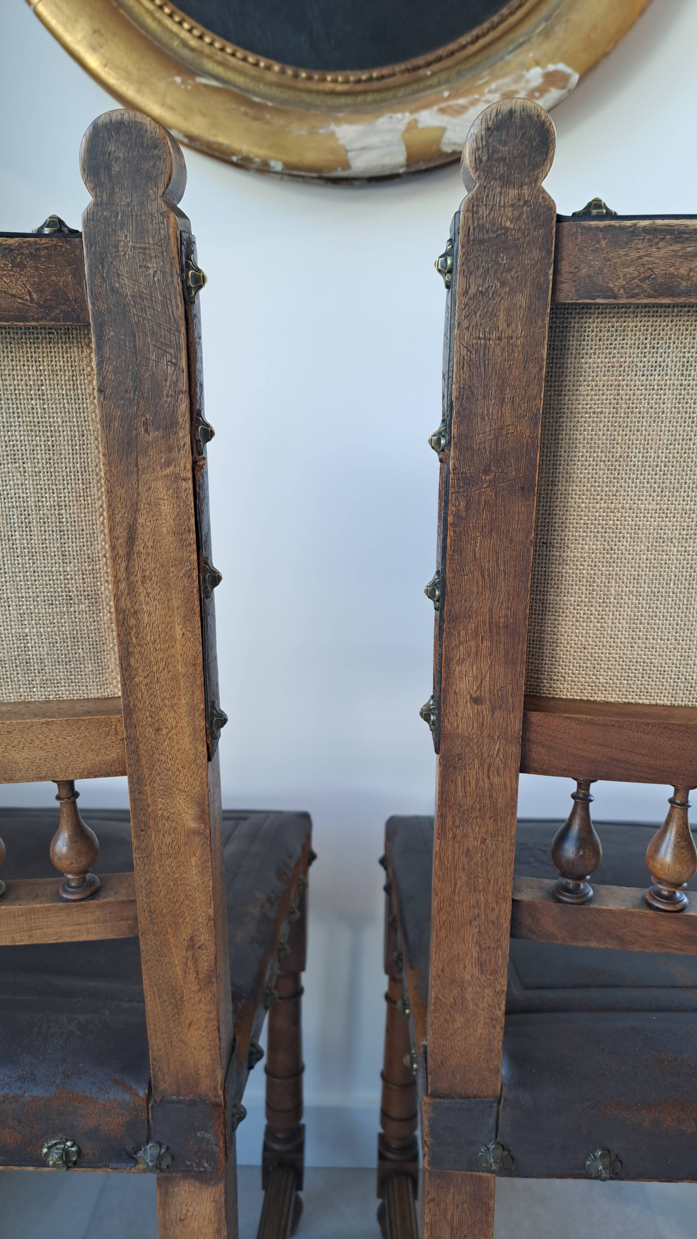 Pair of antique chairs in embossed leather, Henri II style.